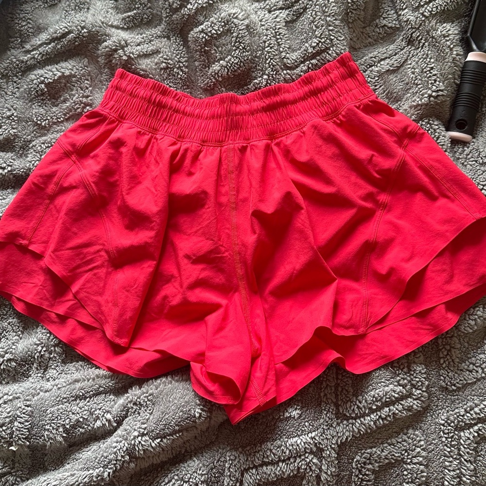 Lululemon Athletica Red Athletic Shorts with Flowy Design